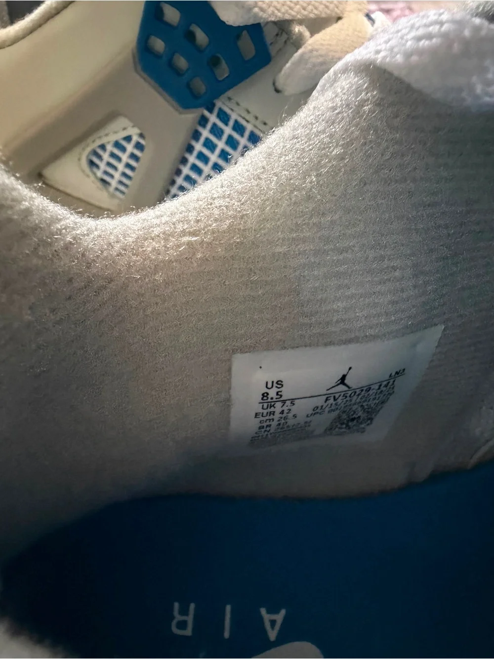 Jordan White and Blue Retro Basketball Shoe